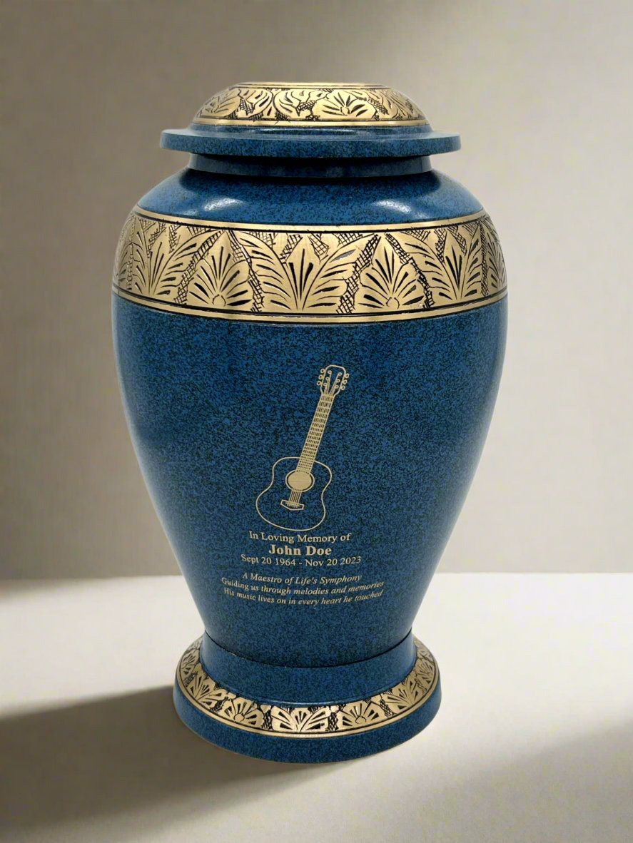 Blue metal urn with gold leaf with guitar engraving