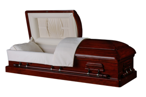 Red mahogany wood casket with white velvet interior.