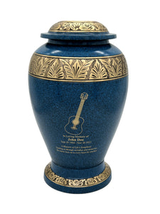 Blue metal urn with gold leaf with guitar engraving