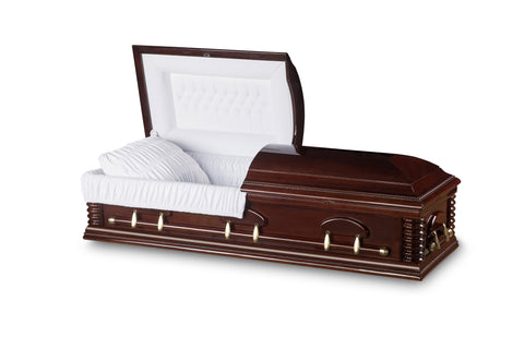 Wooden casket with glossy finish and divine spiral corners. Brass hardware and white interior fabric.