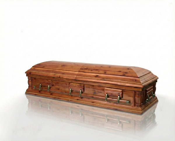 Cedar wood casket with both lids closed on a white background
