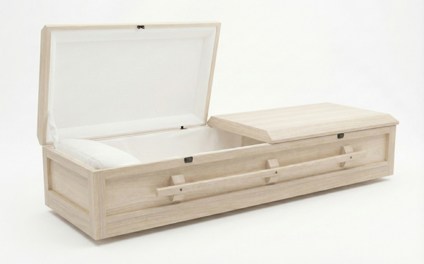 Wooden coffin with open lid on a white background