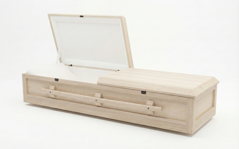 Wooden coffin with open lid on a white background