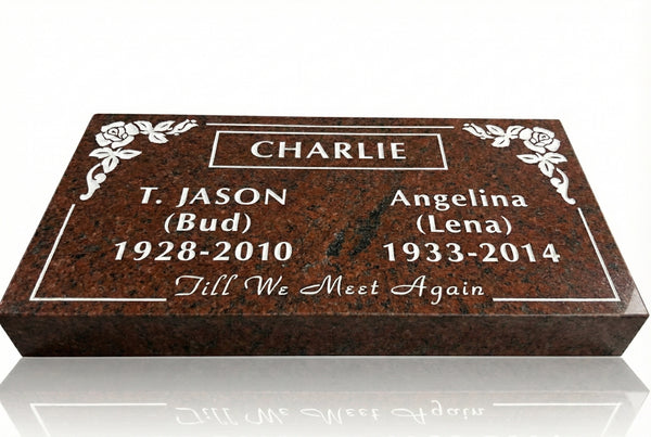 Personalized marble headstone with engraved names and dates on a white background