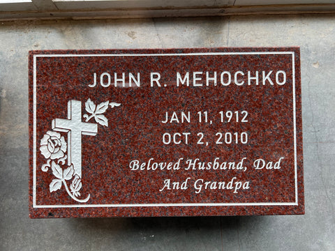 Top view of a pillow marker in red polished granite.