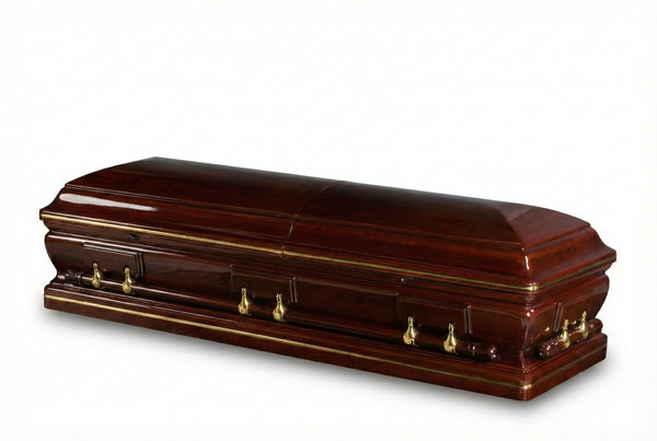 Wooden casket with brass handles on a white background