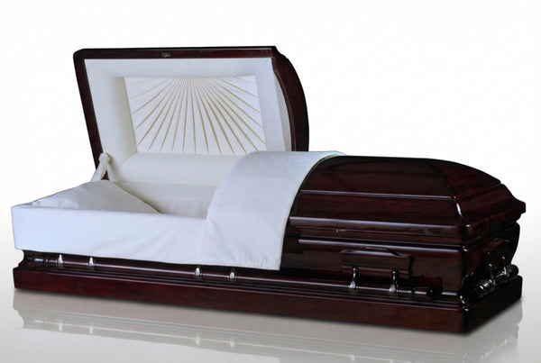Mahogany Casket with white interior on a slightly reflective floor.