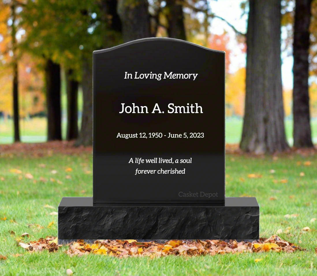 Black granite upright monument with sample inscriptions in white lettering. 