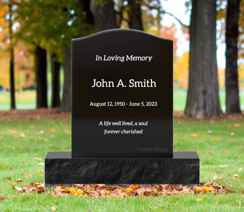 Black granite upright monument with sample inscriptions in white lettering. 