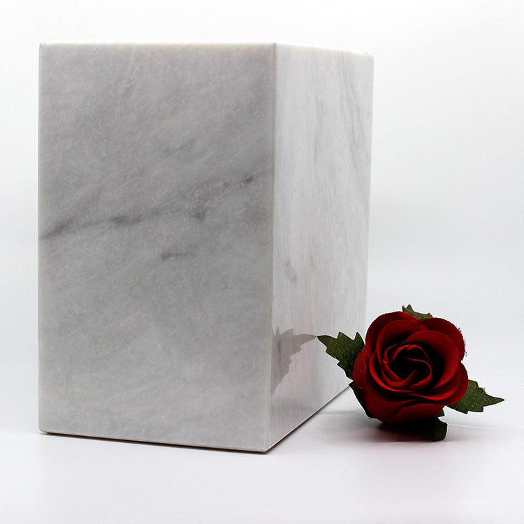 rectangular shaped white marble urn. 