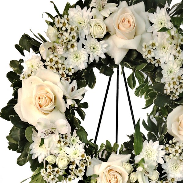 White Floral Funeral Wreath Close Up 