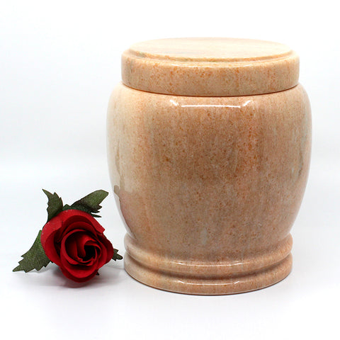 round pink marble urn with flat lid